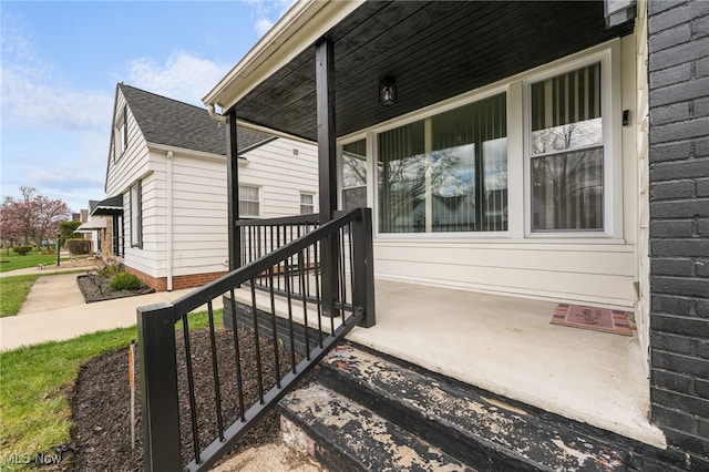doorway to property featuring a porch