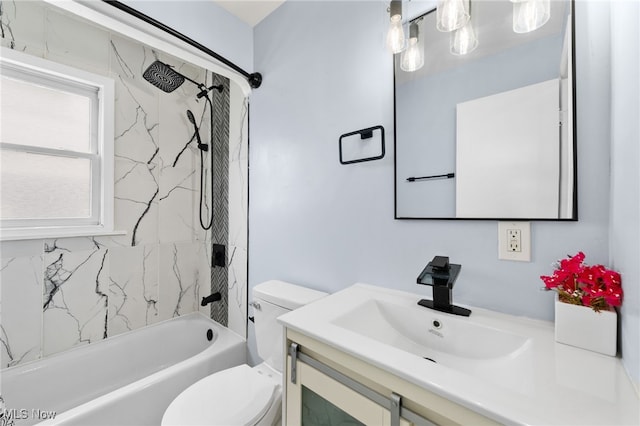 bathroom featuring vanity,  shower combination, and toilet