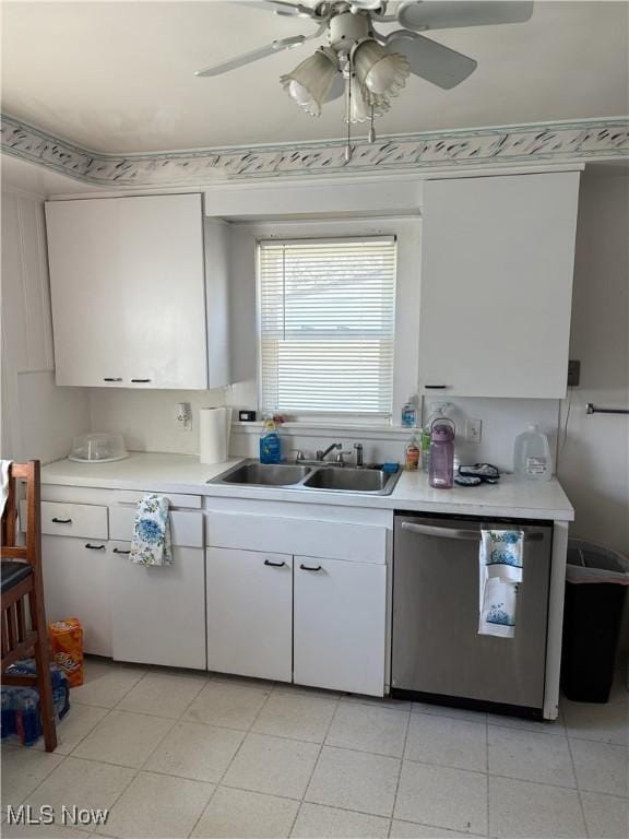 kitchen featuring a sink, light countertops, white cabinetry, and dishwasher