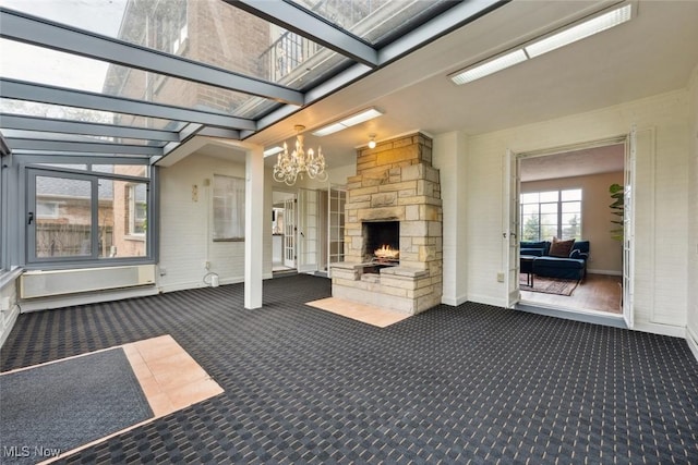 view of patio / terrace with an outdoor stone fireplace