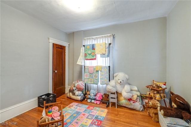 playroom with wood finished floors