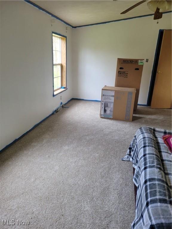 unfurnished bedroom with carpet flooring