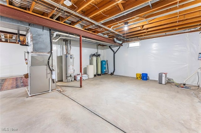 basement featuring heating unit and gas water heater