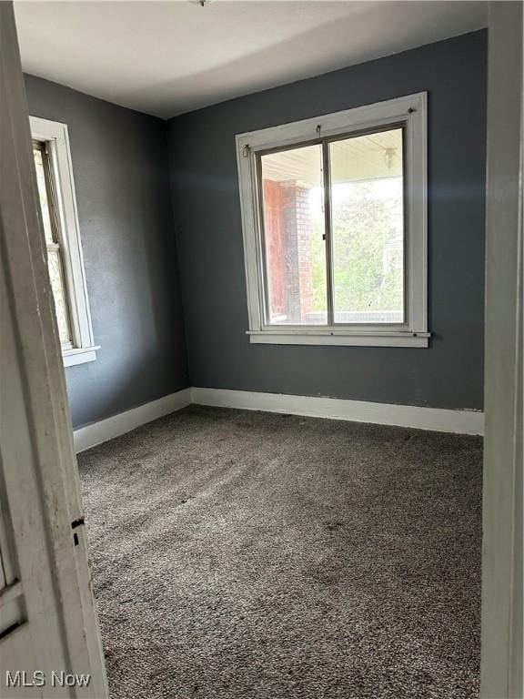 11413 Notre Dame Ave, Cleveland, OH 44104 - carpeted empty room featuring baseboards