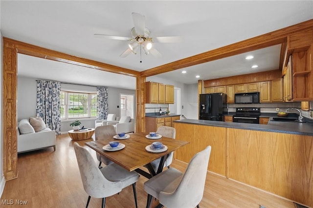 dining space featuring recessed lighting, ceiling fan, beamed ceiling, and light wood-type flooring