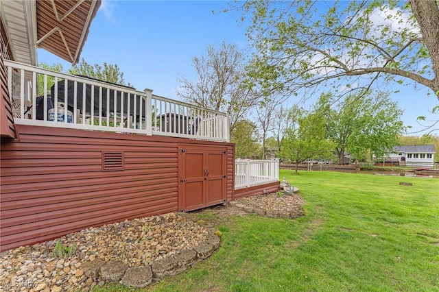 view of yard featuring a deck