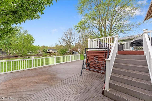 deck featuring stairs