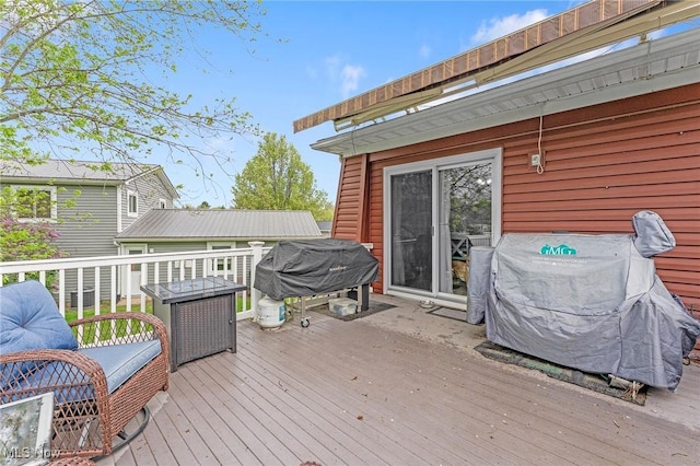 deck featuring grilling area
