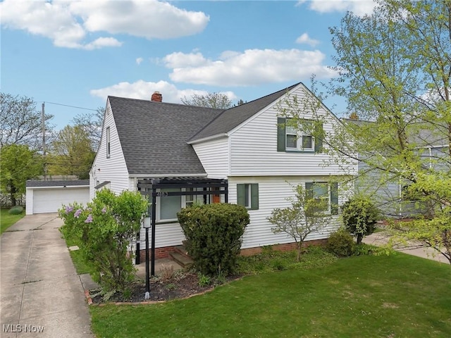 view of front of property with roof with shingles, a pergola, a front lawn, a chimney, and an outdoor structure