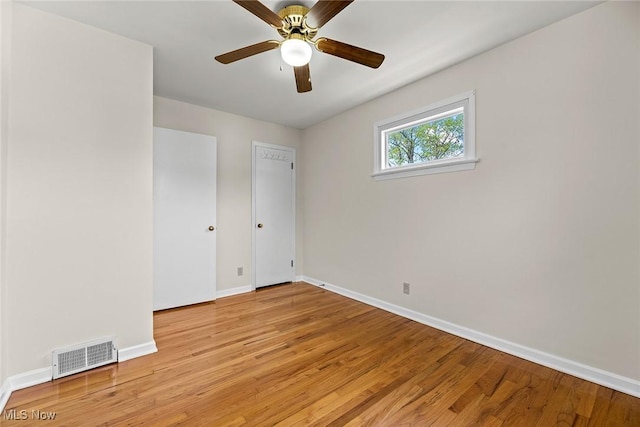 unfurnished bedroom with visible vents, baseboards, and light wood finished floors