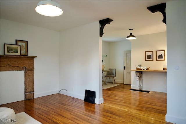 living room with wood-type flooring