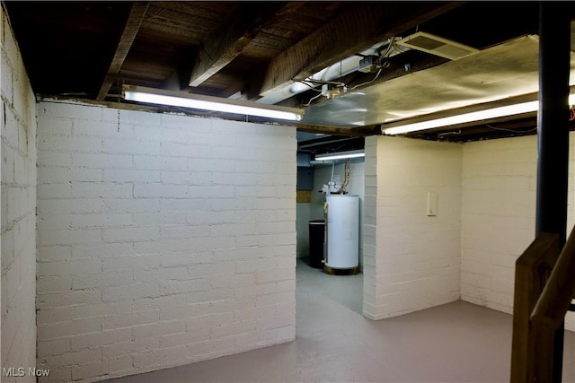 unfinished basement with gas water heater