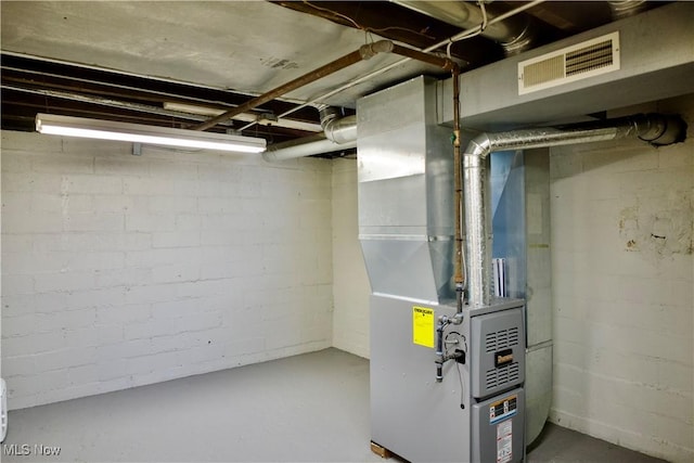 unfinished basement featuring visible vents
