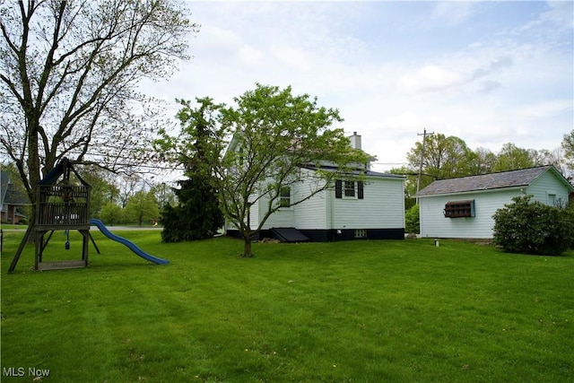 view of yard with a playground