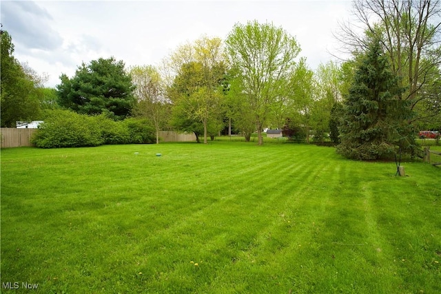 view of yard with fence