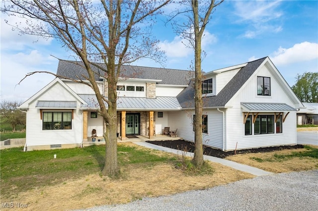 46748 New London Eastern Rd, New London, OH 44851 - modern inspired farmhouse with a standing seam roof, a shingled roof, and metal roof