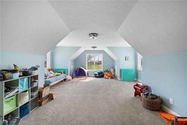 46748 New London Eastern Rd, New London, OH 44851 - rec room with baseboards, carpet, a textured ceiling, and vaulted ceiling