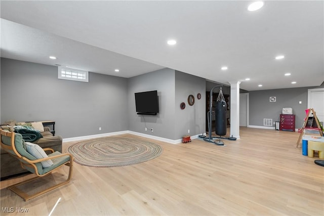 46748 New London Eastern Rd, New London, OH 44851 - workout room with recessed lighting, baseboards, decorative columns, light wood-type flooring, and visible vents