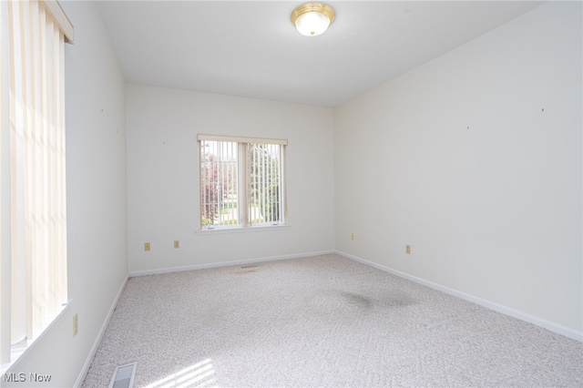 11235 Frederick Ln, Twinsburg, OH 44087 - carpeted spare room with baseboards and visible vents