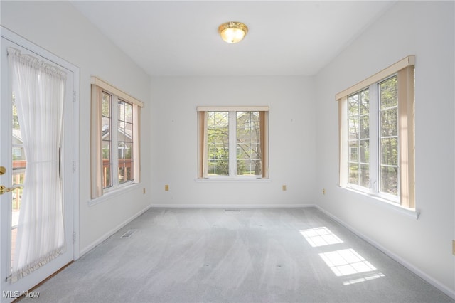 11235 Frederick Ln, Twinsburg, OH 44087 - carpeted spare room with baseboards and a wealth of natural light