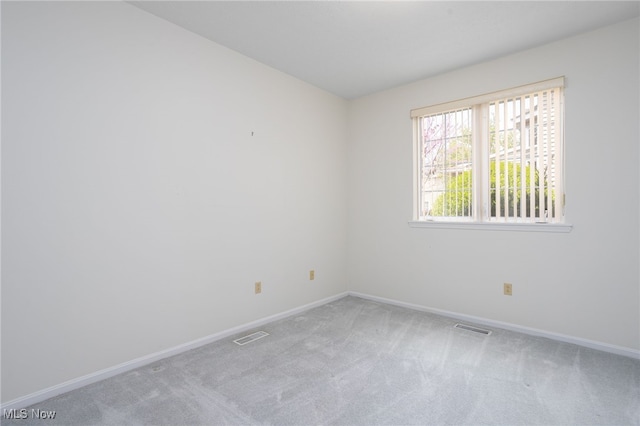 11235 Frederick Ln, Twinsburg, OH 44087 - unfurnished room with carpet floors, baseboards, and visible vents