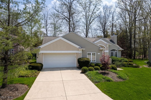 11235 Frederick Ln, Twinsburg, OH 44087 - traditional home with a garage, a chimney, concrete driveway, and a front yard