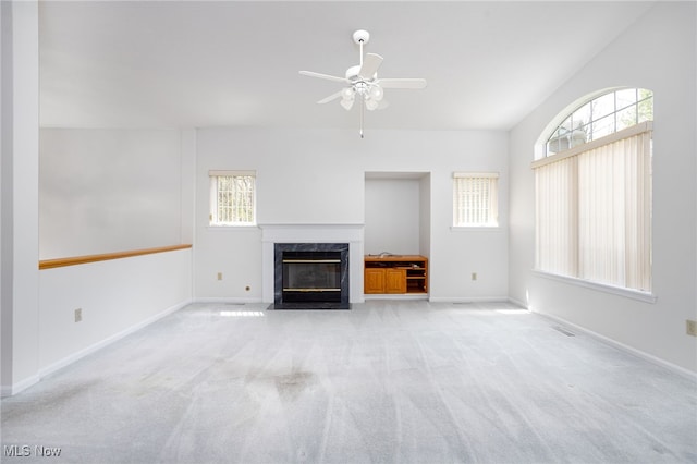 11235 Frederick Ln, Twinsburg, OH 44087 - unfurnished living room featuring baseboards, a ceiling fan, light carpet, and a premium fireplace