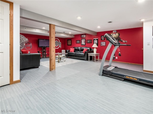 exercise area with recessed lighting and baseboards