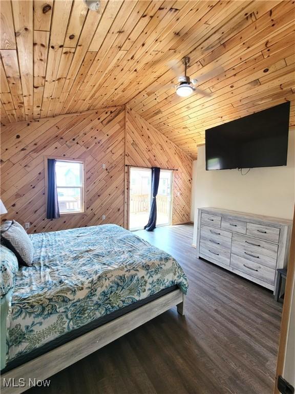 bedroom featuring wood ceiling, wood walls, and wood finished floors