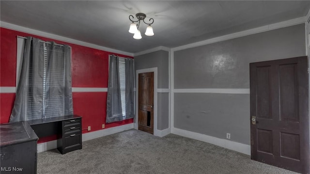 unfurnished bedroom with carpet floors and baseboards