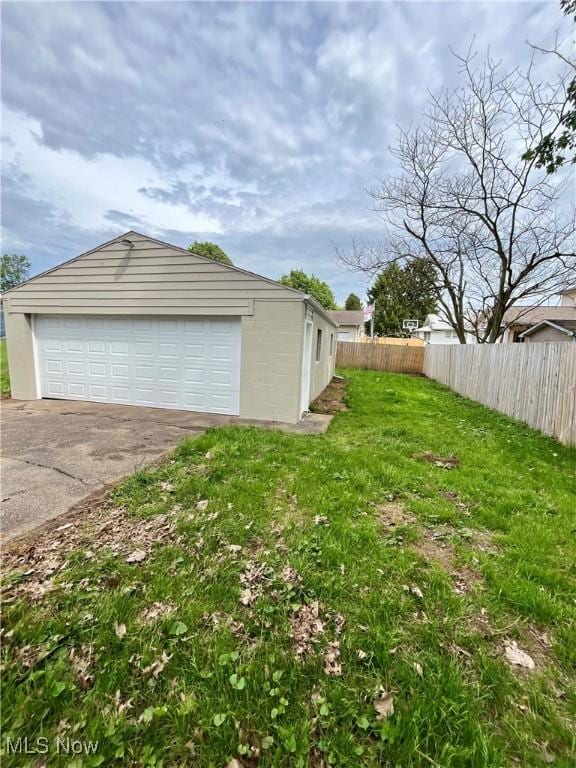 detached garage with fence