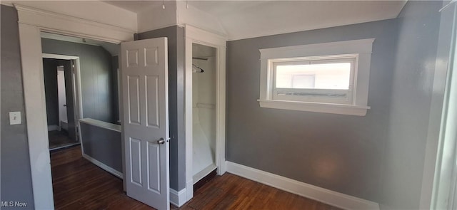 9910 Zimmer Ave, Cleveland, OH 44102 - hallway featuring baseboards and dark wood finished floors