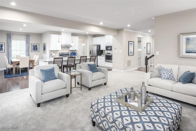 1030 Ashford Ct, Columbia Station, OH 44028 - living area featuring baseboards, recessed lighting, and light colored carpet