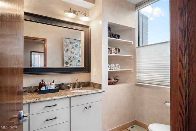 half bath with toilet and vanity