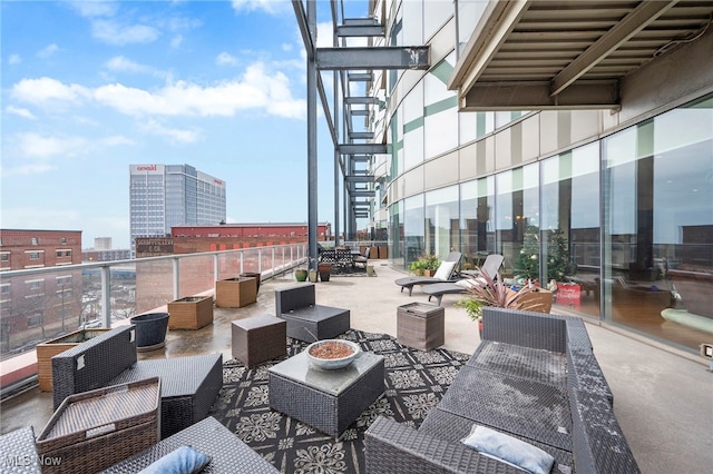 view of patio with a city view and an outdoor hangout area