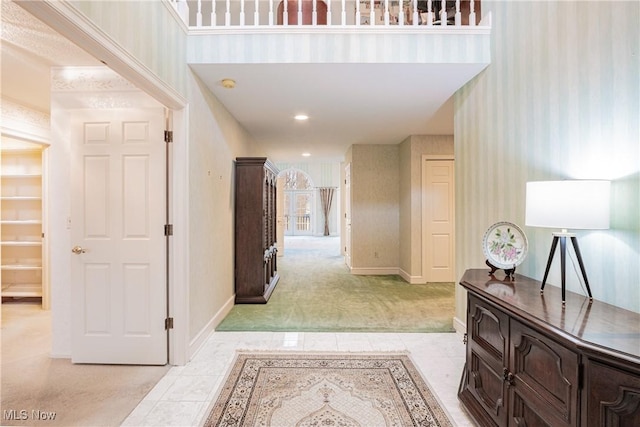 1175 Inverness Ln, Stow, OH 44224 - hall featuring baseboards, light tile patterned floors, and wallpapered walls