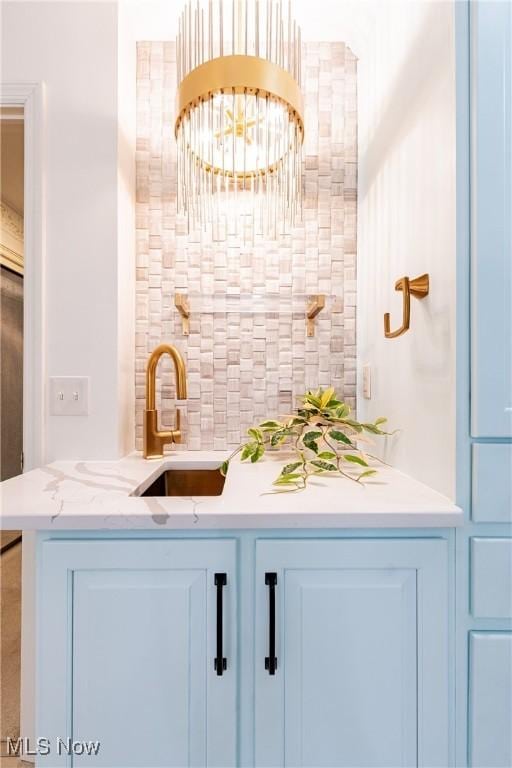 1175 Inverness Ln, Stow, OH 44224 - bar with a sink, indoor wet bar, and backsplash