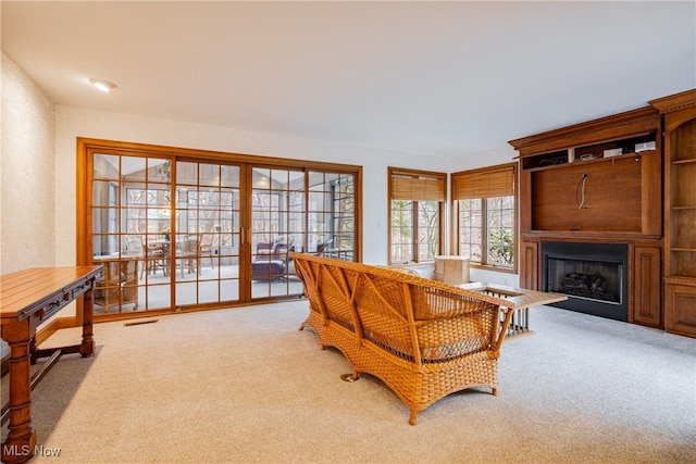 1175 Inverness Ln, Stow, OH 44224 - carpeted living area featuring visible vents and a fireplace