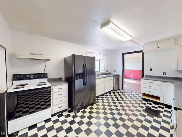 kitchen with white electric stove, stainless steel dishwasher, light floors, black fridge, and under cabinet range hood