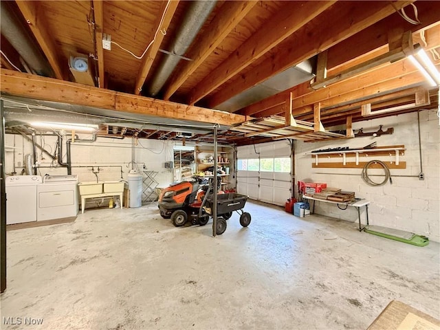 garage featuring independent washer and dryer