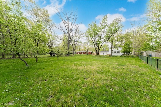 view of yard with fence