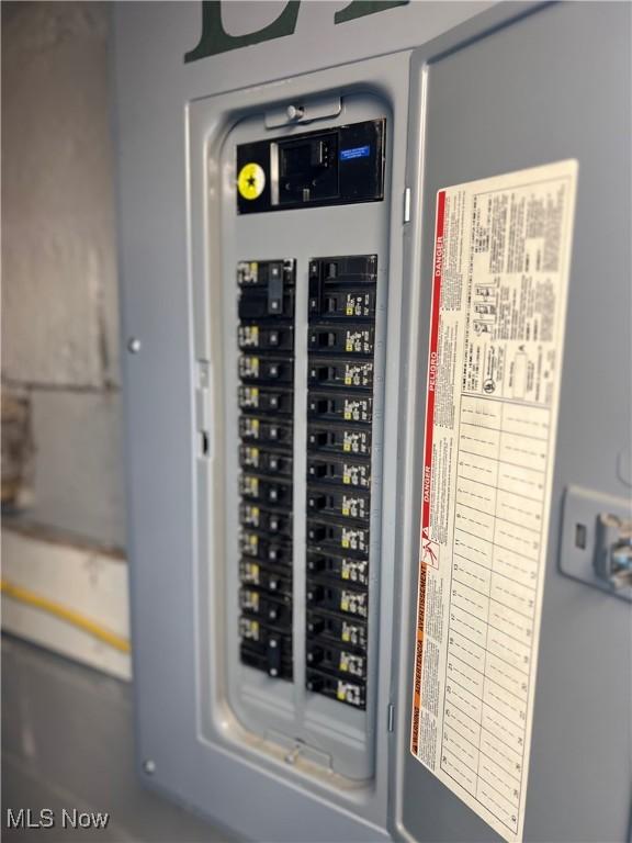 utility room featuring electric panel