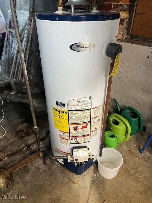 utility room with water heater