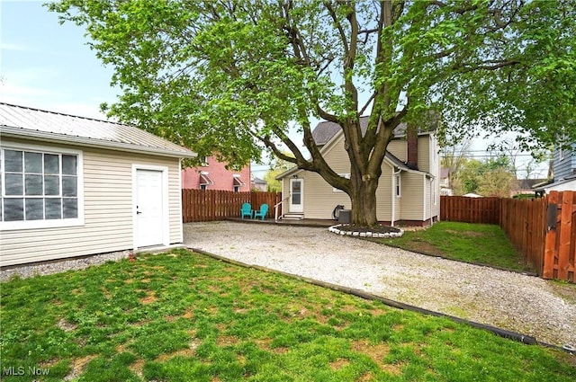 288 College St, Wadsworth, OH 44281 - view of yard featuring a fenced backyard and a patio area