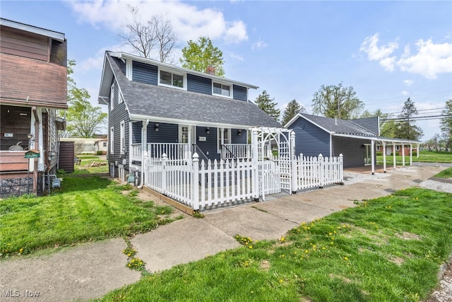 838 N Lincoln Ave, Alliance, OH 44601 - view of front of property with roof with shingles, a fenced front yard, a front lawn, a porch, and a chimney