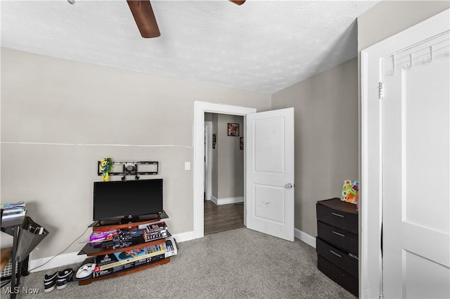 1335 W Blvd, Cleveland, OH 44102 - rec room featuring a ceiling fan, baseboards, and a textured ceiling