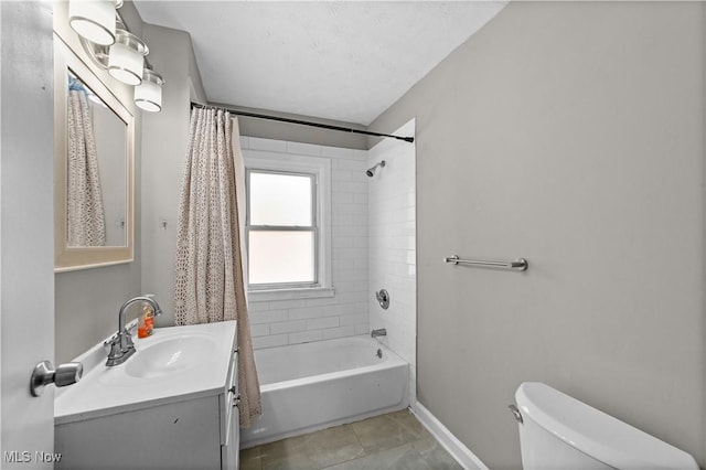 1335 W Blvd, Cleveland, OH 44102 - bathroom with tile patterned flooring, vanity, toilet, baseboards, and shower / bathtub combination with curtain