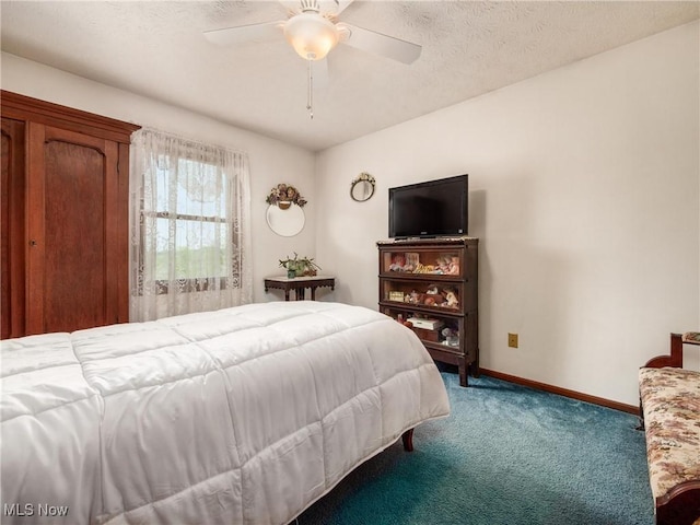 bedroom with carpet flooring, a ceiling fan, and baseboards