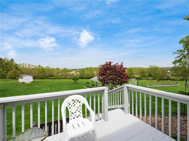 deck featuring a yard
