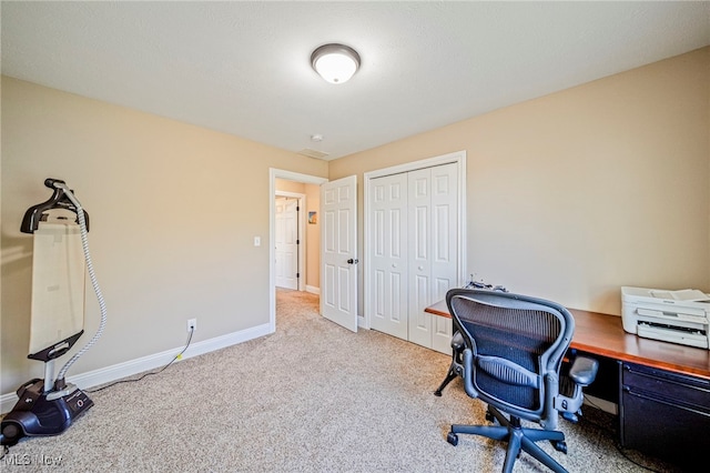 office area with carpet flooring and baseboards